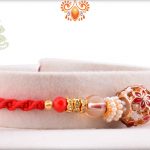 Antique Metalic Design With White Pearl Rakhi And Red Thread 6