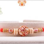 Antique Metalic Design With White Pearl Rakhi And Red Thread 5