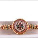 Beautiful Designer Oval Glass Rakhi with Pearls 5
