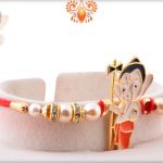 Ganesha with Damru and Pearl Beads Rakhi 5