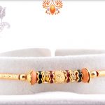 Classic And Elegant Combination Of Golden And Wooden Pearl Rakhi 4
