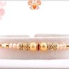 Classic And Beatiful White And Golden Pearls Rakhi 4