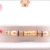 Simple And Golden Shiny Pearl Rakhi 4