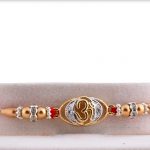 Exclusive Golden OM Rakhi with Beads and Diamond Rakhi 3