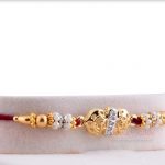 Exclusive Golden OM Rakhi with Pearl Rings 5
