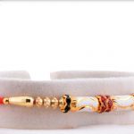 Beautiful White-Golden Long Beads Rakhi with Diamond Rings 4