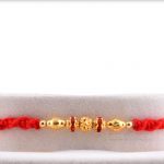 Golden Beads Rakhi with Red Diamond Rings 3