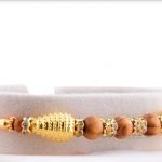 Oval Golden Beads with Sandalwood Beads and Diamonds 5