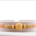 Exclusive Golden Bead Rakhi with Diamond Rings 4