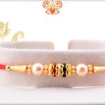 Simple Yet Eyecatching Golden & White Pearl Rakhi 4