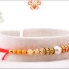 Delicate White Pearl With Gold Touch Rakhi 6