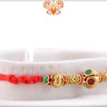 Enchanting Golden Finishing With Metalique Design And Red Thread Rakhi 6