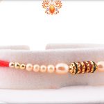 Simple yet Elegant Design with White Pearl Beads Rakhi 6