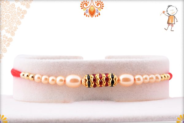 Simple yet Elegant Design with White Pearl Beads Rakhi