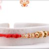 Evergreen Golden Beads And Red Designer Thread Rakhi 5