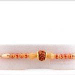 Golden Cap Rudhraksh Rakhi with Oval Pearls 3