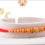 Simple Yet Beautiful Wooden Beads With Red Thread Rakhi 6