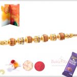 Four Sandalwood Beads with Handcrafted Golden Beads Rakhi 5
