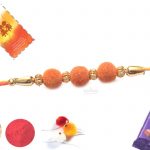 Orange Velvet Rakhi with Mauli Thread