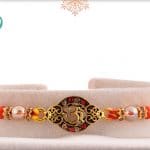 Delicate OM Rakhi with Beads 3