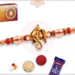 Golden Ganesh Rakhi with Red Beads 4