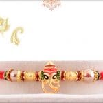 Golden Meenakari Ganesh Rakhi with Beads 3