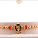Divine Ganesh Rakhi with Red Beads 3