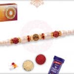 Elegant Pearl Rakhi with Designer Golden Beads 4