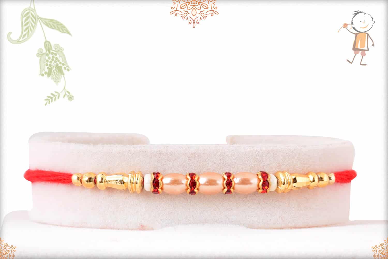 Stunning Pearl Rakhi with Golden Beads and Diamond 1