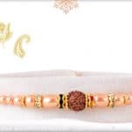 Elegant Pearl Rakhi with Golden Beads 3