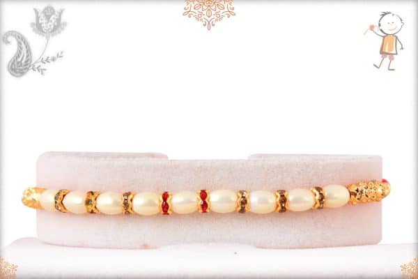 Classy Oval Pearl Rakhi with Diamonds