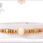 Handcrafted Pearl Rakhi with Golden Beads