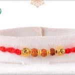 Handcrafted Rudraksh Rakhi with Golden OM Beads