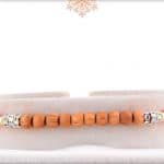 Delicate Sandalwood Beads Rakhi with Diamonds 4