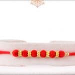 Delicate Red Velvet Bead Rakhi with Golden Rings 3