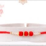 Delicate Red Velvet Bead Rakhi with Pearls 3