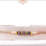 Delicate Gray Velvet Bead Rakhi with Pearls