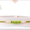 Delicate Green Velvet Bead Rakhi with Pearls 3