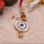 Beautiful White Evil Eye Bhabhi Rakhi - Babla Rakhi