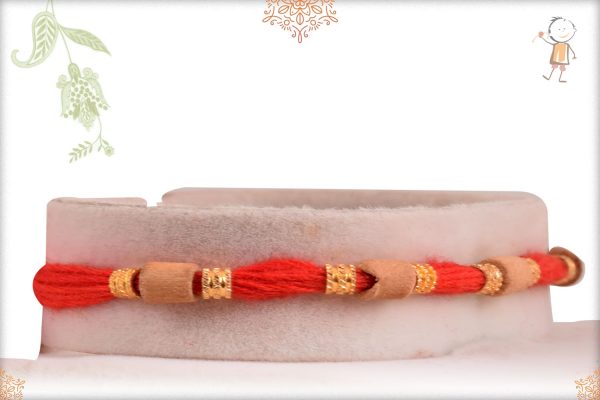 Simply Elegant Sandalwood Beads Rakhi with Golden Beads - Babla Rakhi