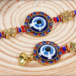 Trendy Evil Eye Bhaiya-Bhabhi Rakhi with Diamonds 4