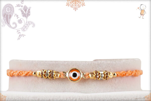 Delicate Pastel Orange Evil Eye Rakhi with Diamond Rings