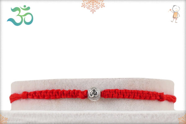 Delicate Silver OM Rakhi with Handcrafted Thread