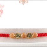 Handcrafted Sandalwood Beads with Golden Beads Rakhi 2