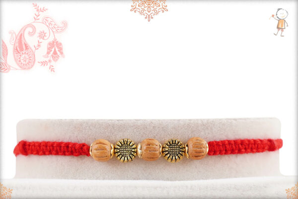 Handcrafted Sandalwood Beads with Golden Beads Rakhi