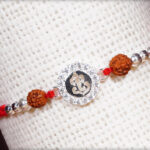 Silver Diamond Ganesh Rakhi with Rudraksh