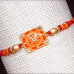 Artistic Orange Rakhi