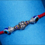 Handcrafted Silver Bead with Evil Eye Rakhi