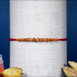 Sandalwood Rakhi with Golden Bead